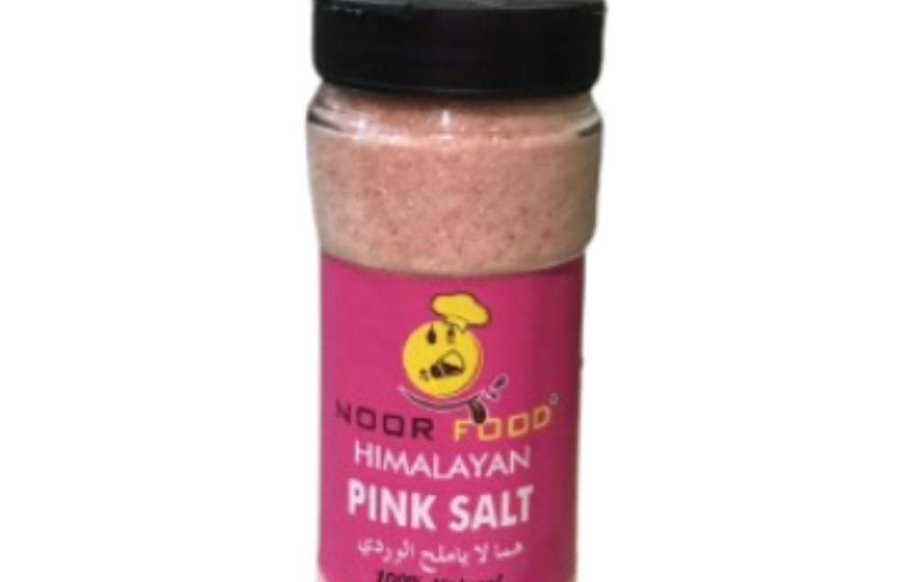 Plastic spice bottles with white sprinkle lids, designed for convenient spice dispensing.